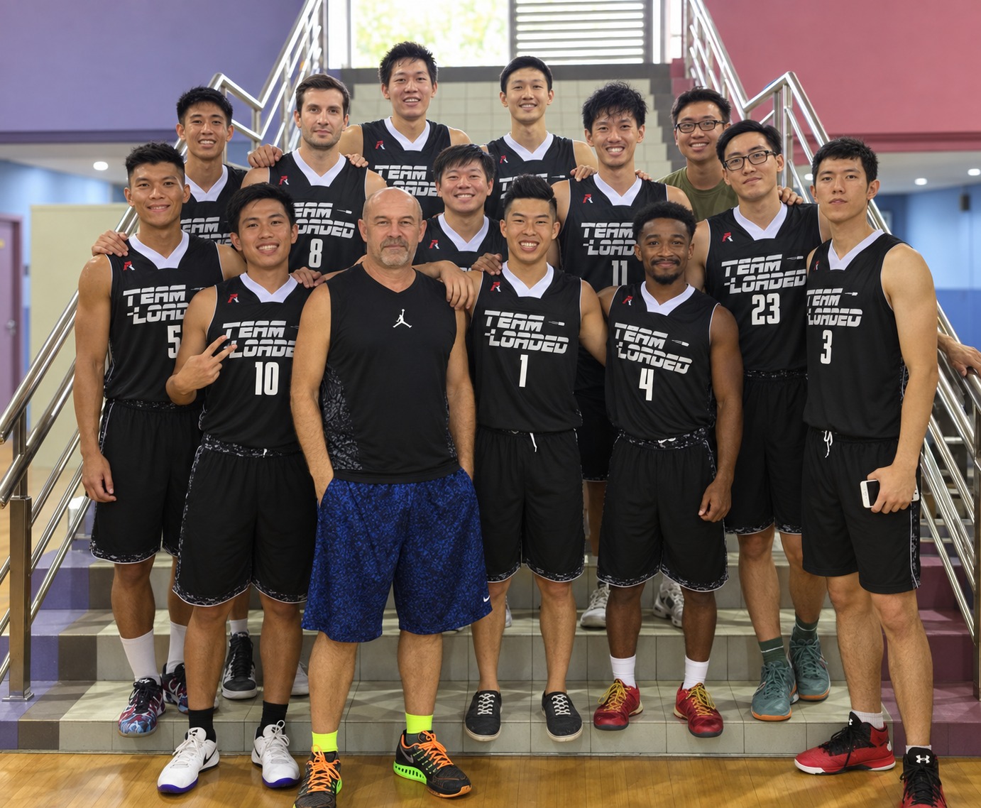 Sergei Belyakov with a basketball team in Singapore